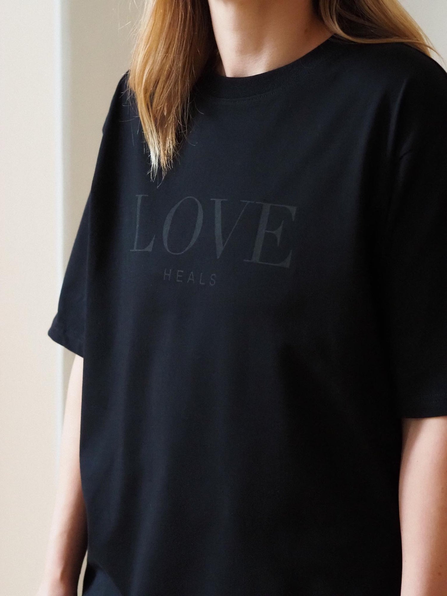 Love Heals Unisex T-shirt, All Black